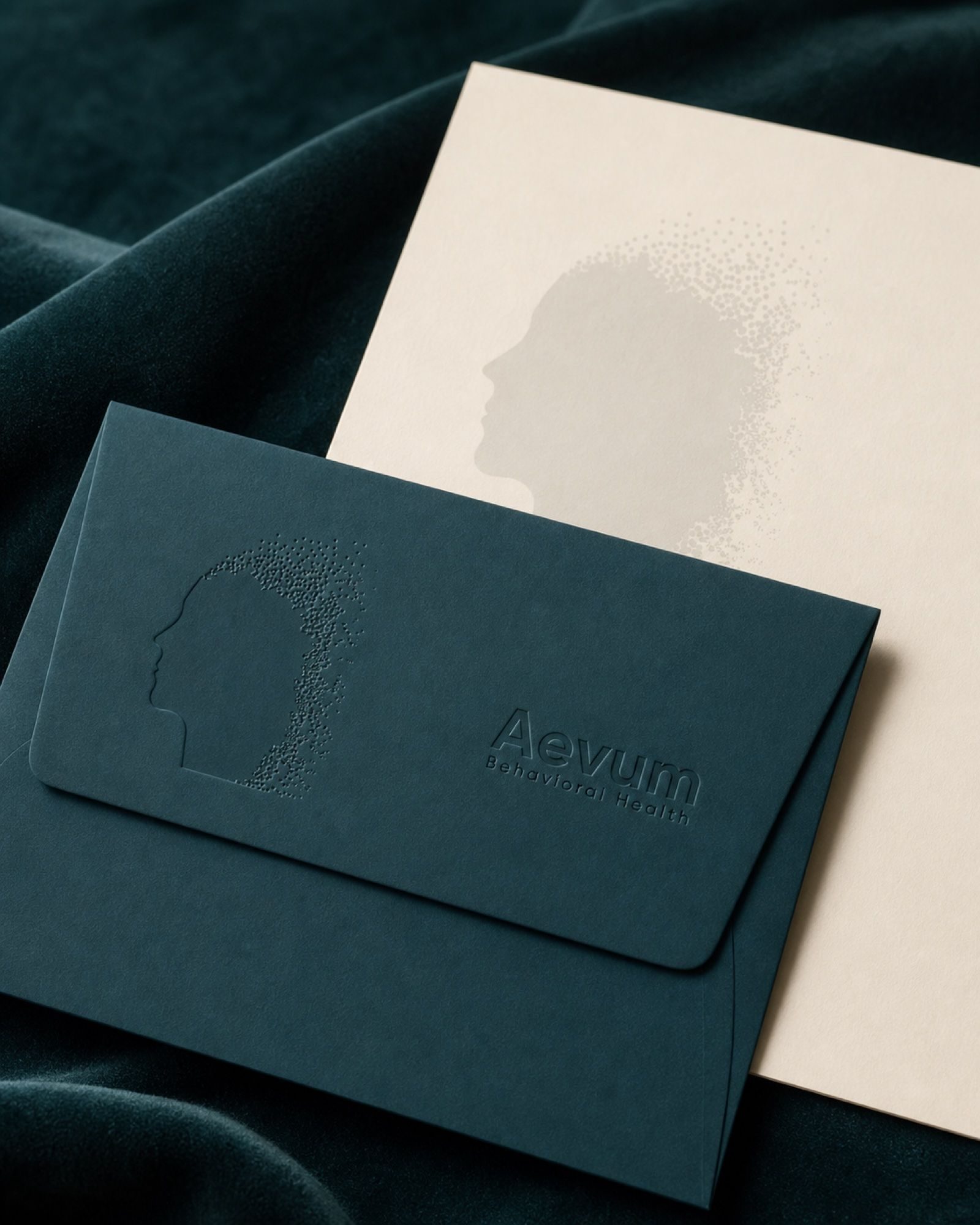 Letterhead and envelope, printed to match down to the paper stock.