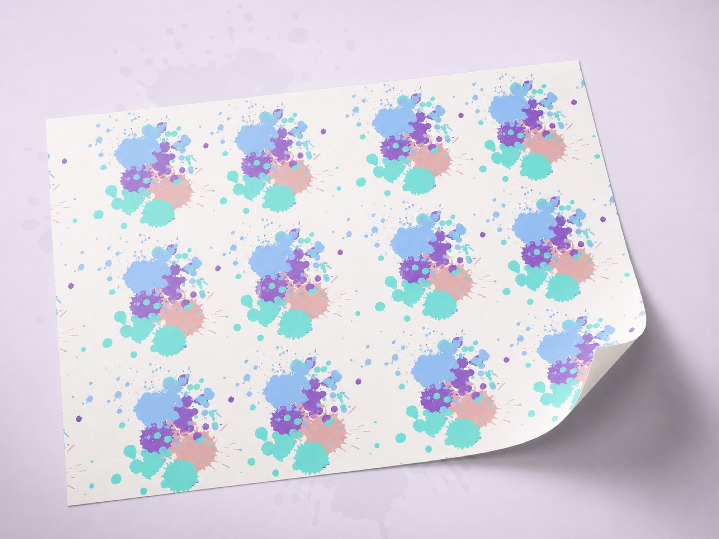 The splatter turned into a seamless repeat, printed full-sheet and peeling up at the corner like real stock.