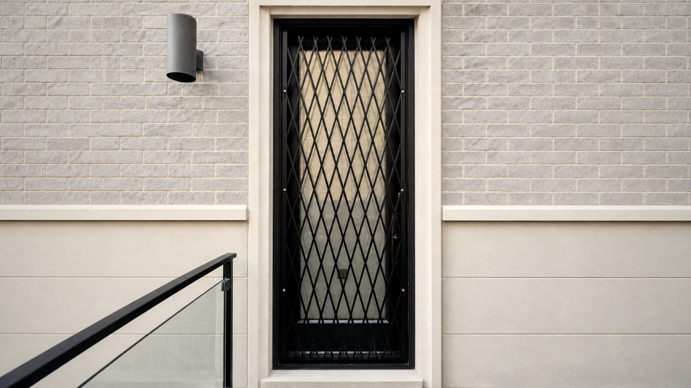 A narrow entry, gated tight to the frame — no gaps to work with.