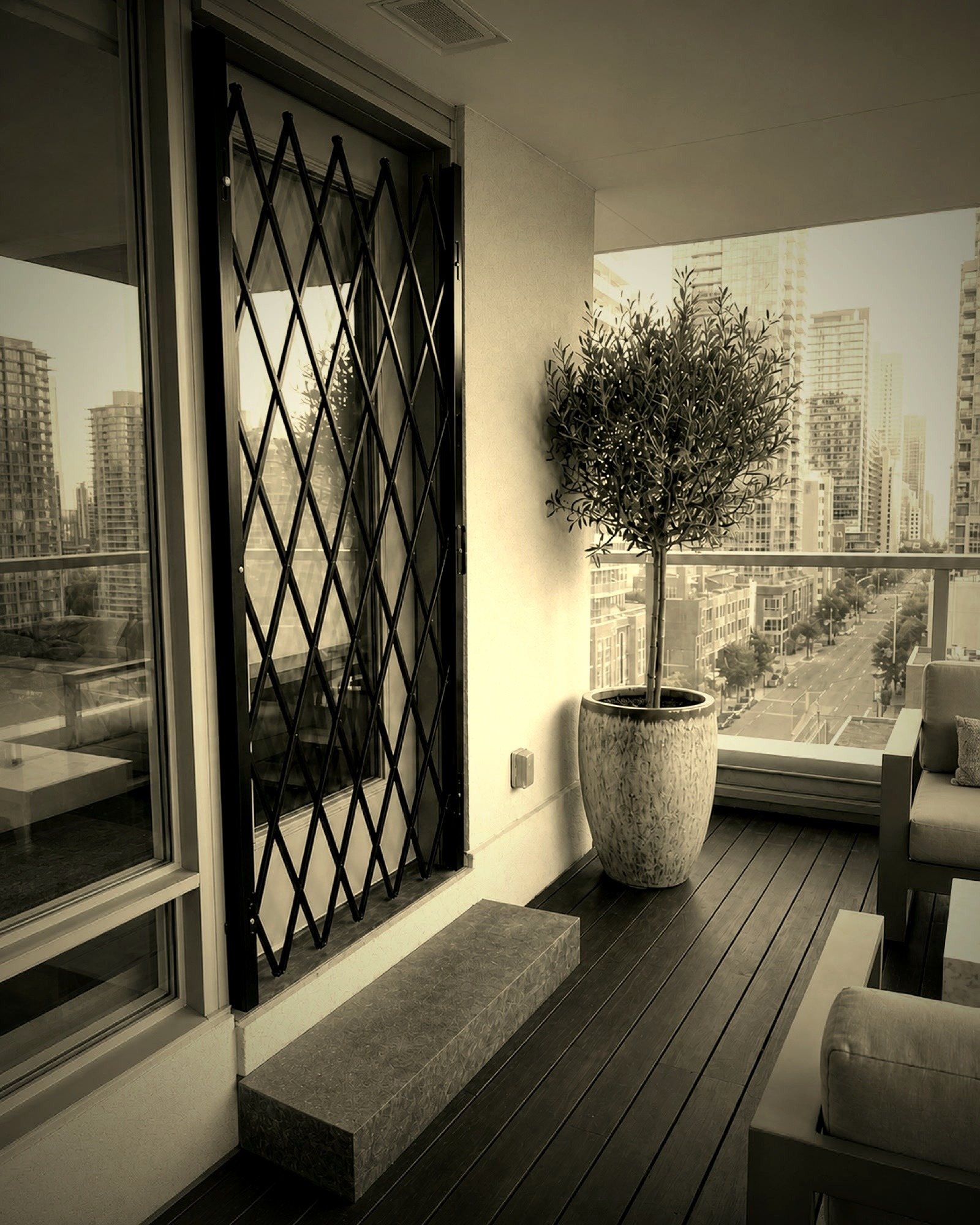 A condo balcony slider, gated the same way a ground-floor door would be.